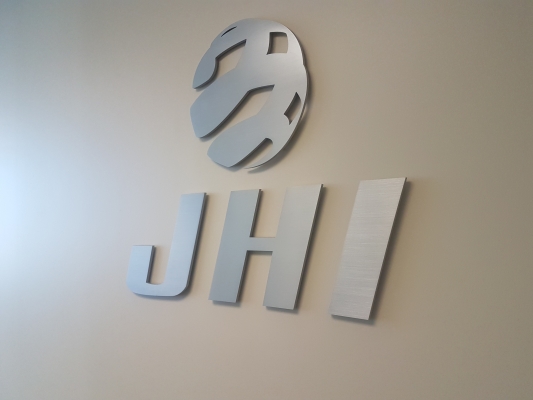 Brushee aluminium 3D logo for JHI