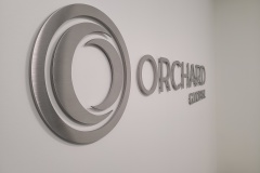 Brushed-3D-cut-steel-logo-Orchard-Global