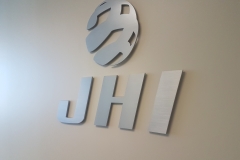 Brushee aluminium 3D logo for JHI