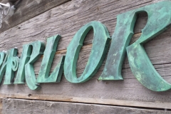 Custom bronze letters patina