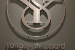 Raised cutout logo in brushed alumium metal