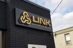 Titanium gold stainless steel fabricated letters illuminated from behind