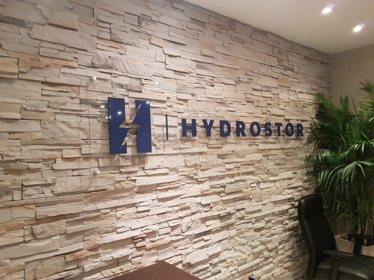 Clear acrylic reception sign with 3D raised logo Hydrostor