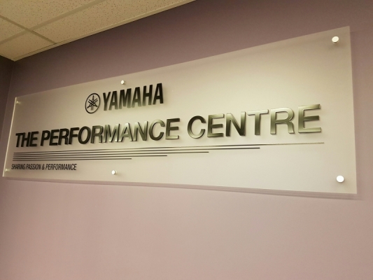 Frosted acrylic reception sign with 3D raised letters for YAMAHA CANADA.