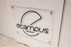 Clear-acrylic-reception-sign-Ecampus