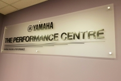 Frosted acrylic reception sign with 3D raised letters for YAMAHA CANADA.