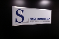 Singh Lamarche LLP custom 3D letters painted aluminium with double aluminium backer, installed with standoff pins.