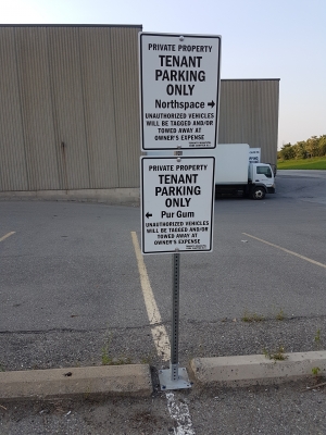 Custom free standing parking sign with metal post and plate