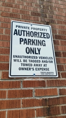 Parking sign Authorized Only