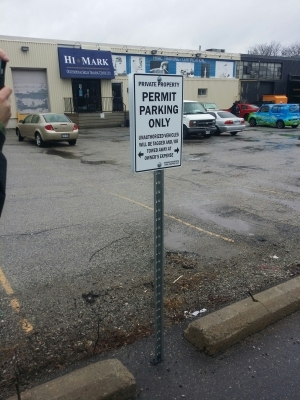 Permit parking only signs on u channel post