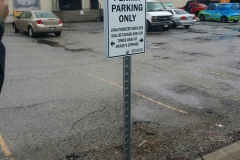 Permit parking only signs on u channel post