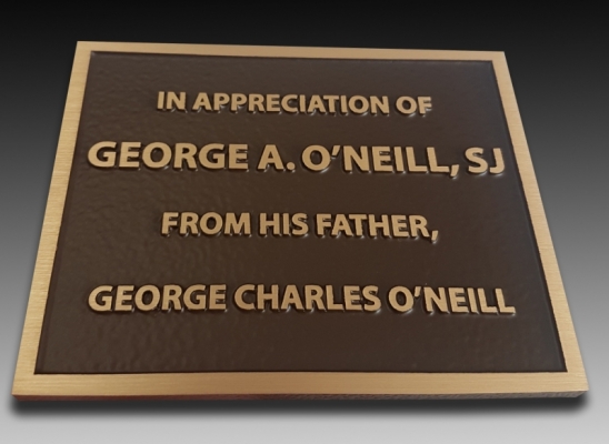 Bronze plaque with raised text In appreciation