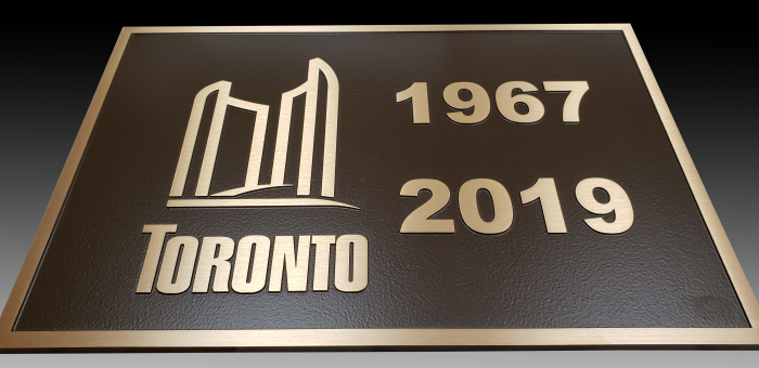 Bronze-plaque-with-raised-text-and-border-for-restored-bridge-Toronto