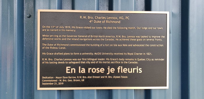 Bronze-plaque-with-raised-text-and-border-Rose