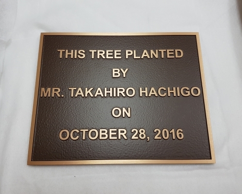 Custom bronze tooled plaque Hachigo