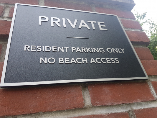 Solid aluminium plaque with raised text and border