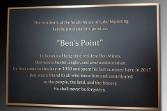 Bronze plaque with raised text and border Ben