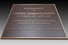 Custom bronze plaque with raised text and raised bevel border