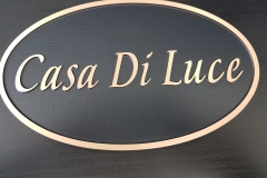 custom brushed bronze plaque with raised text and border Casa Di Luca